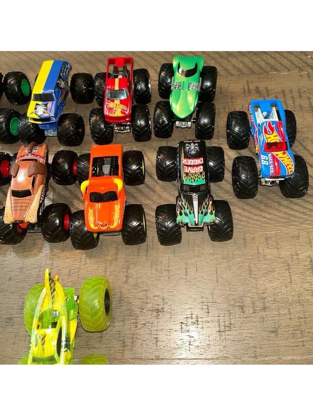 Hot Wheels Monster Trucks Lot of 11 Mixed Vehicles Shark Truck Grave Digger More
